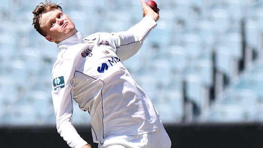 MELBOURNE, AUSTRALIA - FEBRUARY 11: Matthew Kuhnemann of Queensland bowls during the Sheffield Shield match between Victoria and Queensland at Melbourne Cricket Ground, on February 11, 2023, in Melbourne, Australia. (Photo by Jonathan DiMaggio/Getty Images)