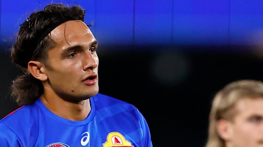 Jamarra Ugle-Hagan (left) during warm-ups for Saturday night’s match.