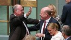 Warren Entsch congratulates Liberal MP Trent Zimmerman, who had just given his first speech in Parliament on  March 2, 2016. Both men campaigned for gay marriage.