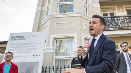 The Stanmore auction drew a crowd from bidders, neighbours and onlookers.