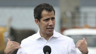 Venezuela's self-proclaimed interim president Juan Guaido speaks in front of the warehouse housing US humanitarian aid on  February 23 before a failed attempt to break a border blockade.