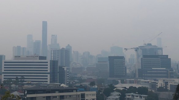 A smoke haze blankets Brisbane CBD on Monday morning.