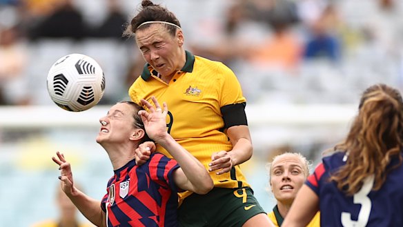 Caitlin Foord rises to win a header against USA on Saturday. 
