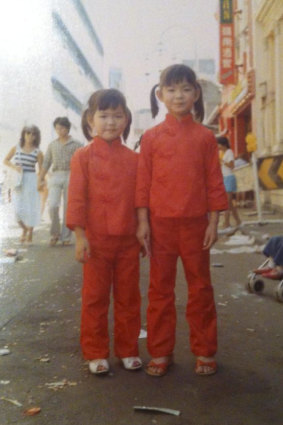 Lucy and Nancy Chen of Mr Chen's celebrating Chinese New Year as children.