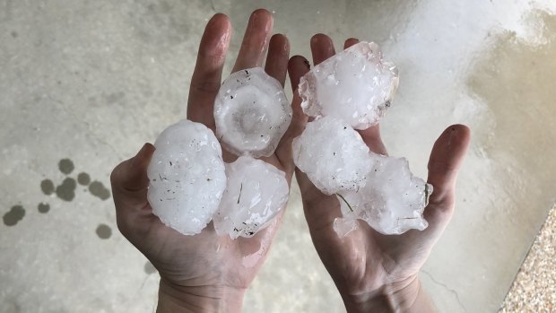Storms dump 'tennis ball, baseball' hailstones before cold snap rolls through