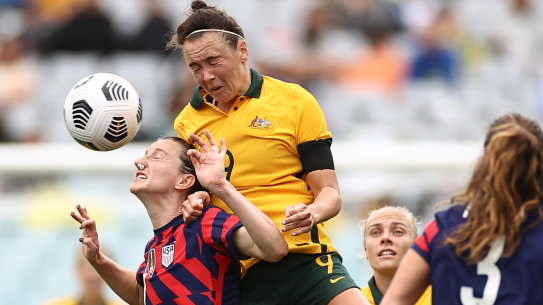 Caitlin Foord rises to win a header against USA on Saturday. 