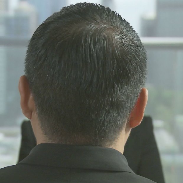 Koh agreed to appear on Four Corners and let us use his full name and position, but asked that we film only the back of his head.