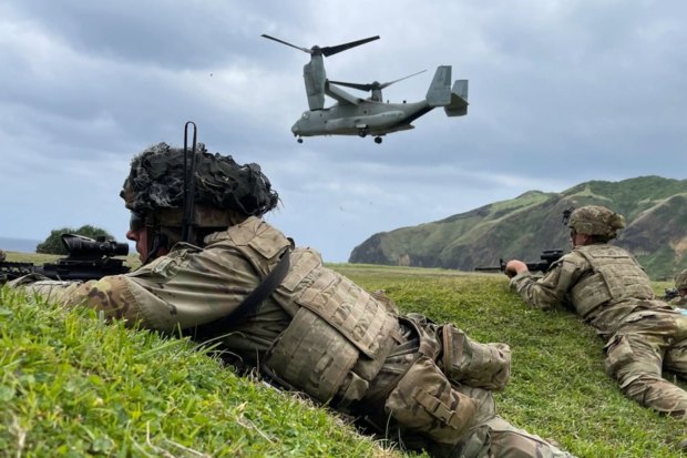 US troops simulate an amphibious air assault during a training exercise on Batan island on April 23.