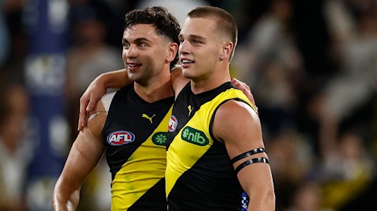 Lalor and Tim Taranto celebrate the unlikeliest of victories.