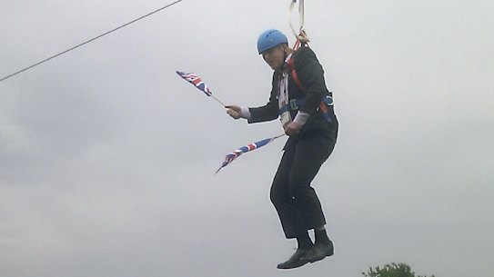 Boris Johnson dangles on a zipline over crowds in London during the 2012 Olympic Games.