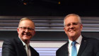 Australian Prime Minister Scott Morrison and Australian Opposition Leader Anthony Albanese shake hands during the third leaders’ debate at Seven Network