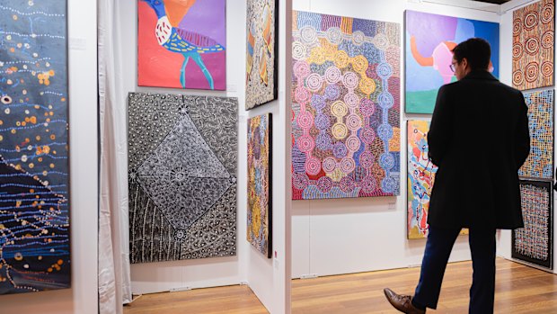 Art enthusiasts enjoy the vibrant atmosphere and accessible offerings of the Affordable Art Fair.
