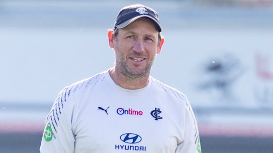 The Blues’ interim coach Josh Fraser (left) will coach his first game this weekend.