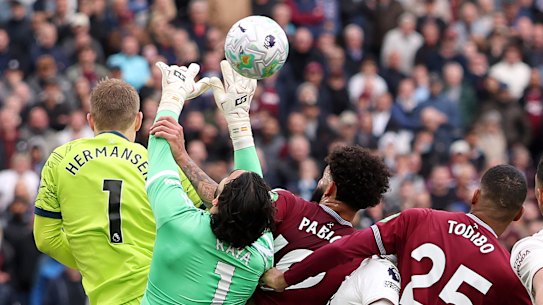 The arm of Pablo grabbing onto Arsenal keeper David Raya in the lead up to the no-goal decision.