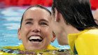 Australia’s silver medal winners Kaylee McKeown, Jenna Strauch, Emma McKeon and Mollie O’Callaghan celebrate after the awards ceremony.