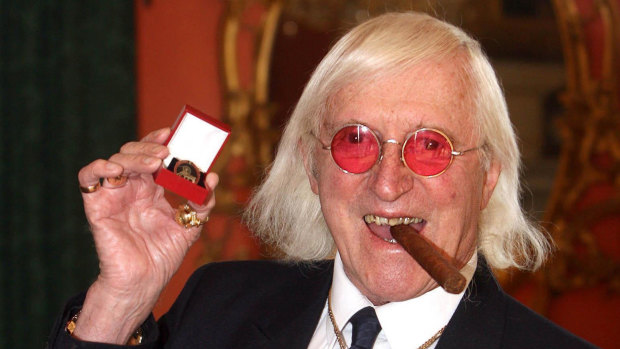 Sir Jimmy Savile, who for decades was a fixture on British television in 2008. 
