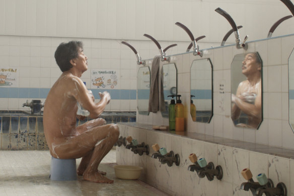 Koji Yakusho plays Hirayama, whose simple daily routine includes a visit to a public bathhouse.