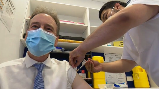 Health Minister Greg Hunt received his COVID-19 booster shot on Sunday.