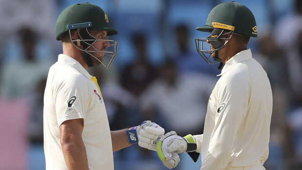 Significant: Aaron Finch (left) and Usman Khawaja digging in during Australia's unexpected draw.