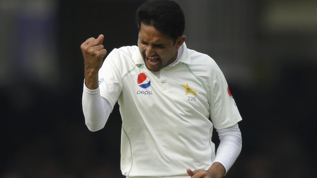 On top: Mohammad Abbas, celebrates taking the wicket of  Dom Bess.