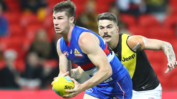 Caught short: Billy Gowers on the ball for the Bulldogs during their heavy round 9 defeat by Richmond.
