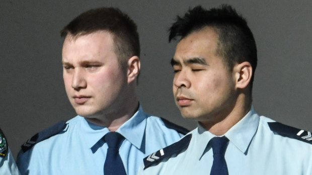 Senior constables Jakob Harrison, left, and Frederick Tse outside the Coroners Court to hear the inquest findings into the police shooting of Danukul Mokmool.