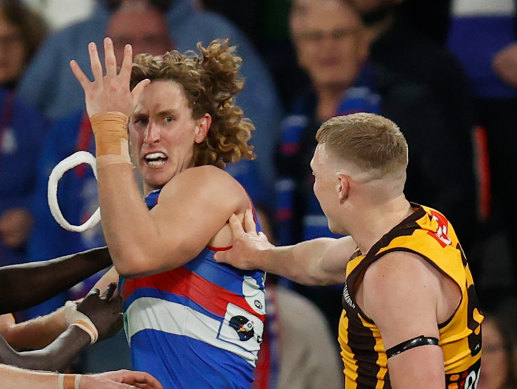 Sicily pulled off Naughton’s headband in the Dogs’ win over the Hawks.