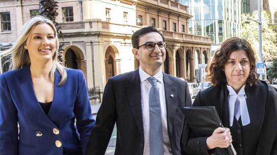 Surgeon Munjed Al Muderis, centre, outside the Federal Court in Sydney on Monday, and his barrister Sue Chrysanthou, SC, right.