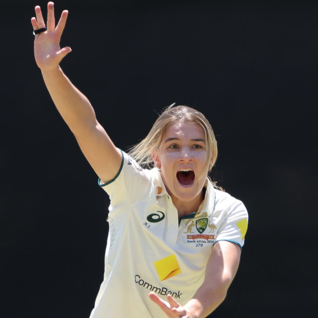 Australian bowler Annabel Sutherland celebrates after claiming the wicket of Tazmin Brits.
