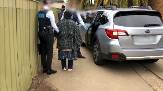 The AFP has arrested three people over allegations they forced a woman to marry a man who would allegedly go on to murder her.