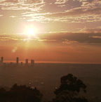Smoke haze across Brisbane as fires burn west of the city.