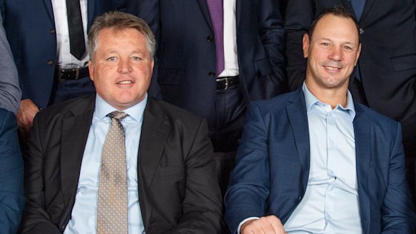 Matt Cockbain, right, with Andrew Blades in a 20th anniversary photo shoot with the members of Australia's 1999 Rugby World Cup-winning team.