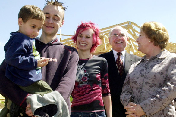 John and Janette Howard with first home buyer Ivan Kenny-Sumija and his family at their under co<em></em>nstruction Rowville home during the 2001 Aston byelection campaign.