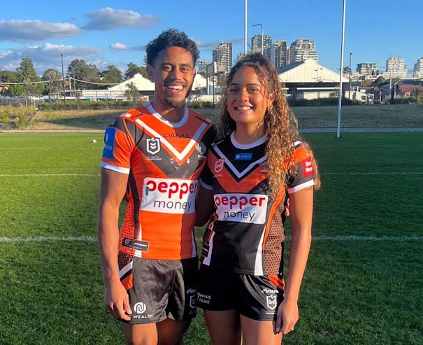 Jahream Bula and his wife,Aaliyah,in Wests Tigers colors.