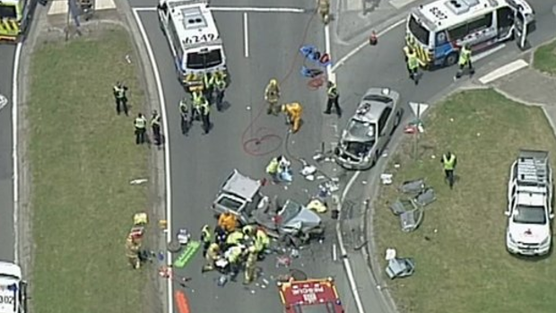Emergency services attend a fatal crash on the South Gippsland Highway in Cranbourne North. 
