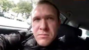 A still taken from a video confirmed by New Zealand police shows this man in a car with guns before he entered a mosque in Christchurch and began shooting. 