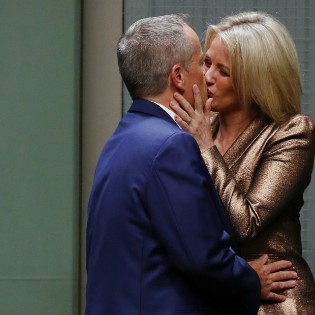 Chloe congratulates her husband following his Budget reply speech at Parliament House in 2017. 
