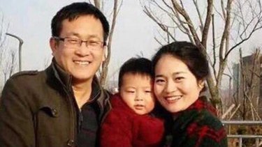 Chinese human rights lawyer Wang Quanzhang, pictured with his wife and child, has been jailed for more than four years in China.