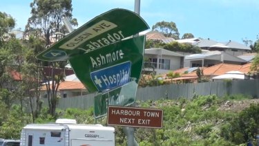 The accident left a road sign bent almost in half.