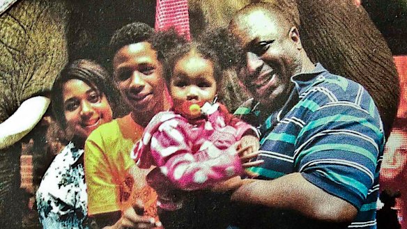 Eric Garner (right), pictured with his family, said 'I can't breathe' 11 times before he died. 