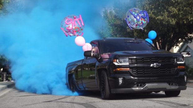 Gender reveals are popular on YouTube, where videos are uploaded of people revealing the gender of their child. In this screengrab, a YouTuber reveals the gender of their child as a boy while doing a burnout using blue smoke.