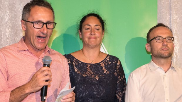 Alex Bhathal on the night of her defeat at last year's Batman byelection, with party leader Richard Di Natale and Melbourne MP Adam Bandt. 