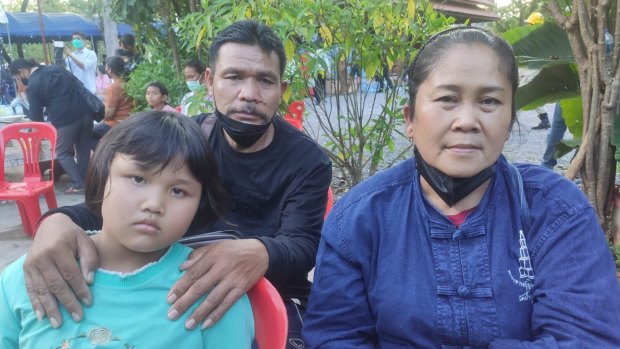 Somkuan Karadee, right, with husband Daokanong and granddaughter Malinee, 9. Malinee’s four-year-old brother Thanakorn was among those killed on Thursday.