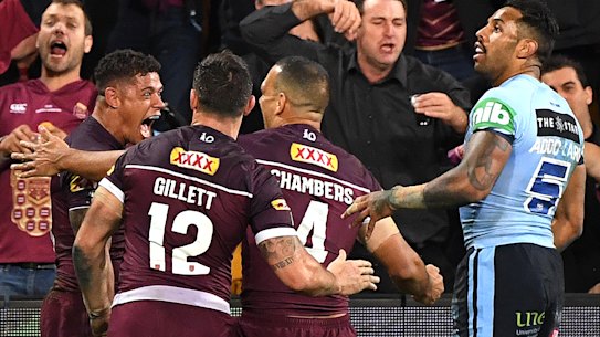 Queensland celebrate Gagai's 95m intercept try.