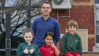 Principal Michael Portaro with students Mara Naidoo, Rose Bull and Charlie Thomas at Elsternwick Public School