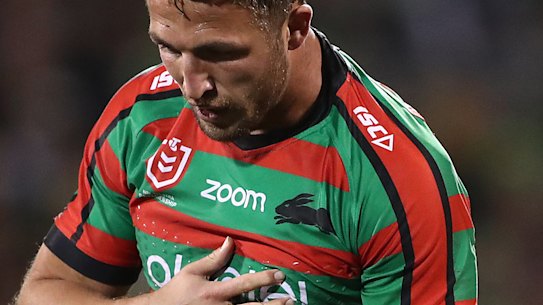 Sam Burgess holds his shoulder during the preliminary final against the Raiders.
