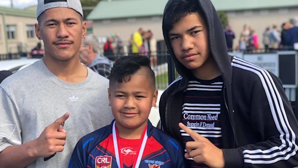 Talatau Amone with his brothers Api and Viliame.