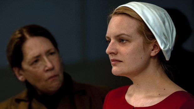 Ann Dowd, left, and Elisabeth Moss in an earlier scene from The Handmaid's Tale.