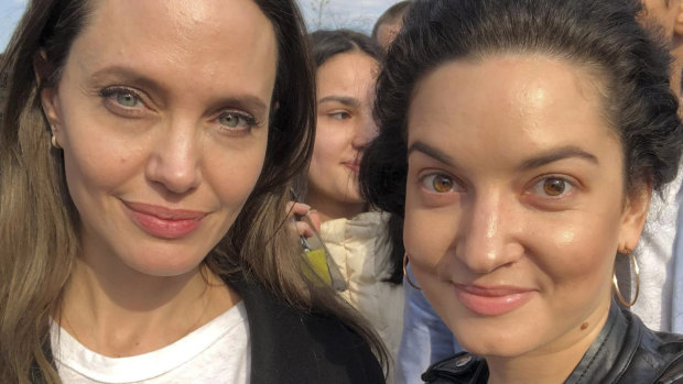 Angelina Jolie, Hollywood movie star and UNHCR goodwill ambassador, poses for a photo with fans in Lviv, Ukraine, in March.