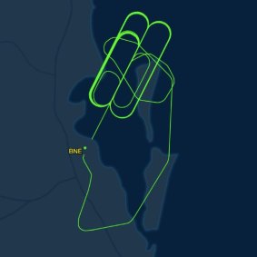 The Virgin Australia flight circled for hours, eventually landing after 12.40am on Tuesday.